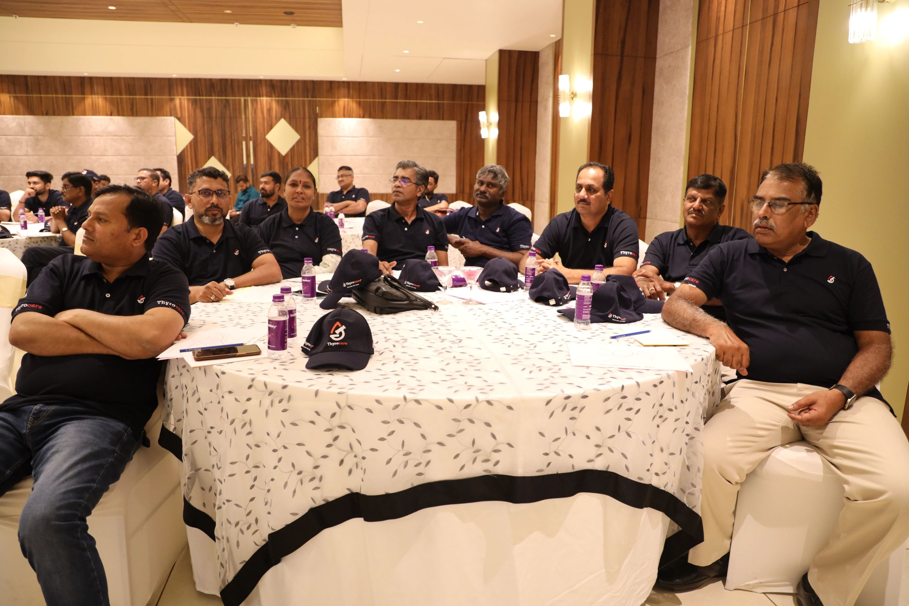 A dealer team engaged in an Avinash Chate business coaching session