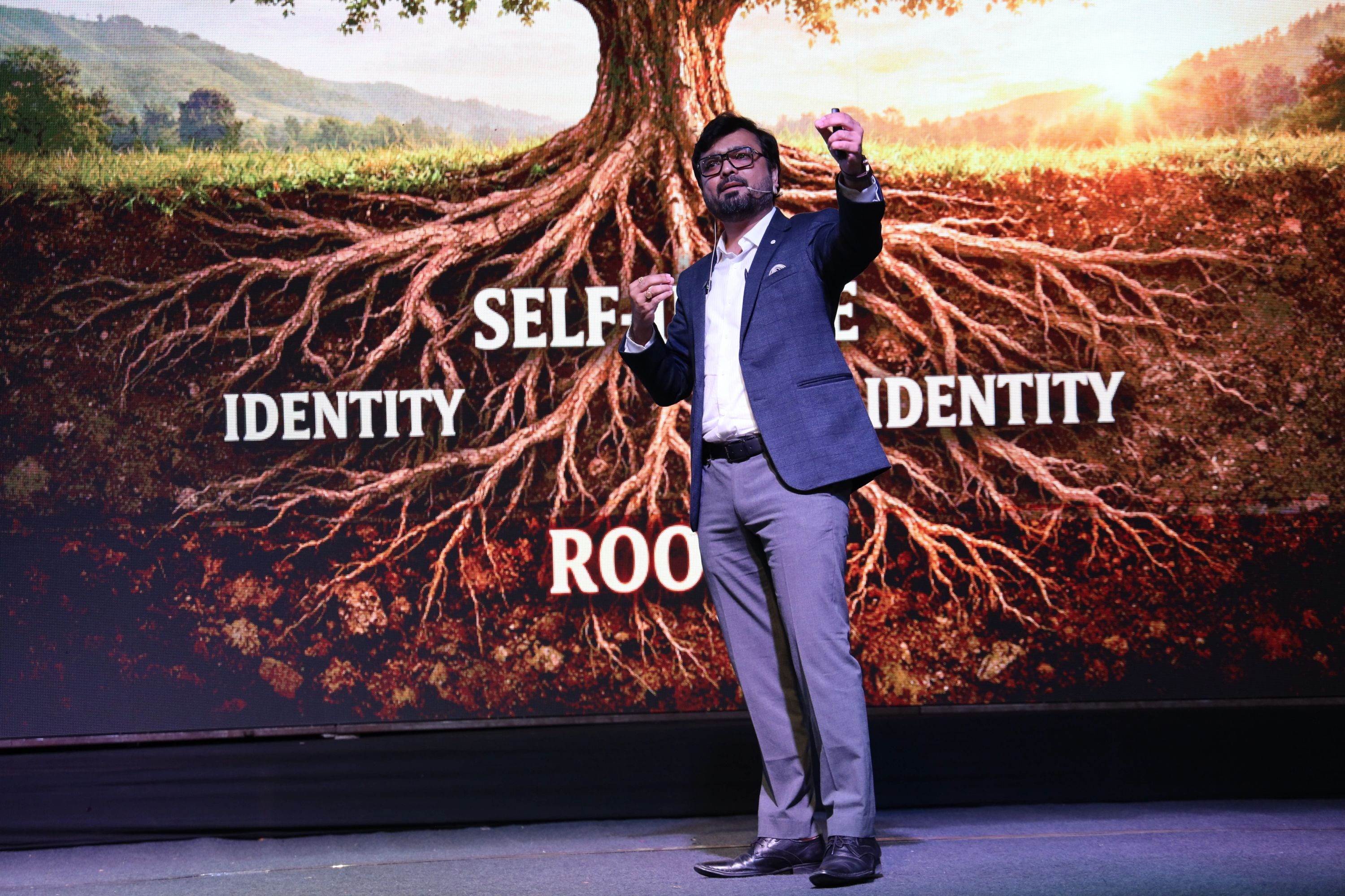 Avinash Chate speaking on self-image and identity at a leadership keynote
